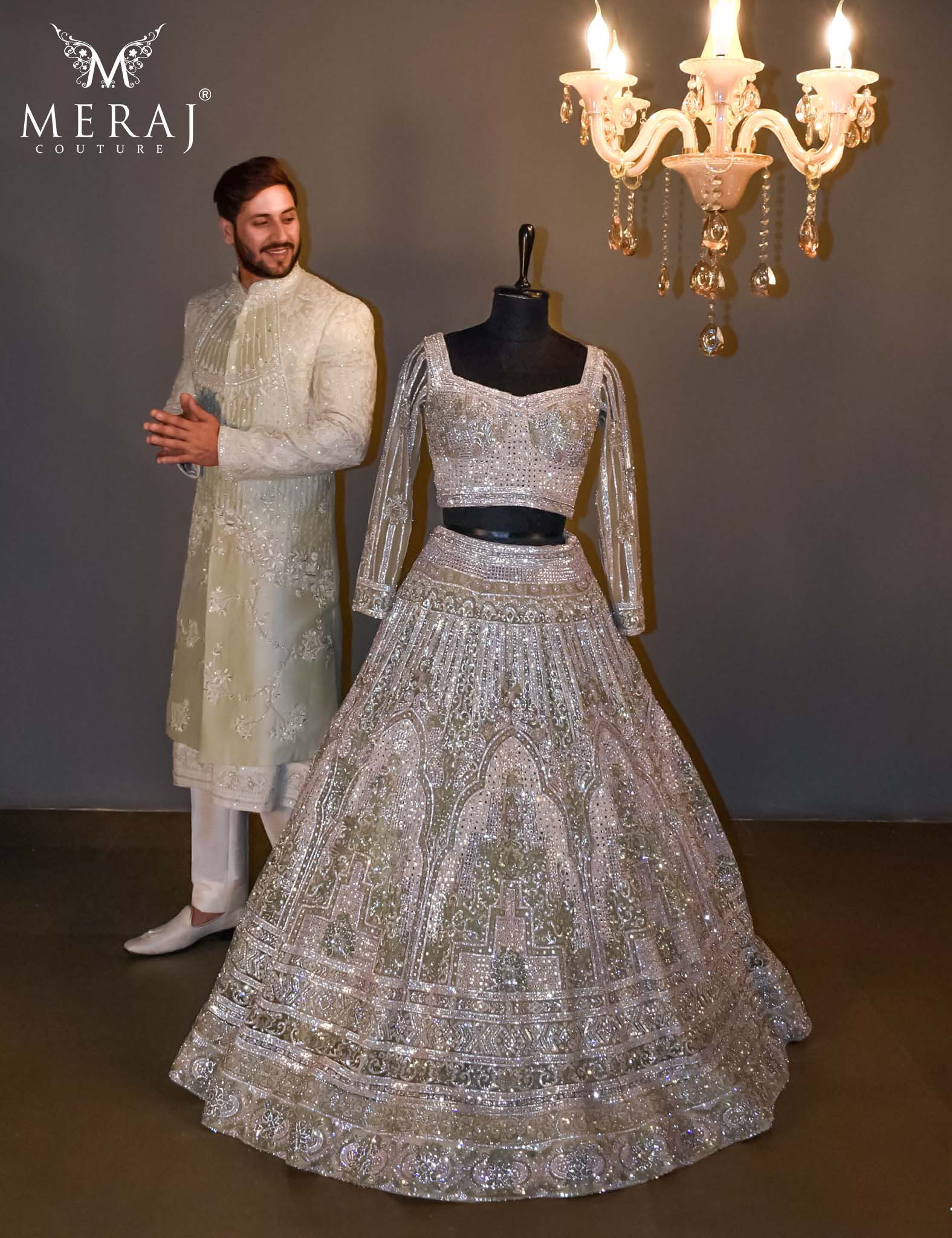 Soft Olive Green Net Bridal Lehenga  paired With A Luxurious Hand-Embroidered Raw Silk Sherwani