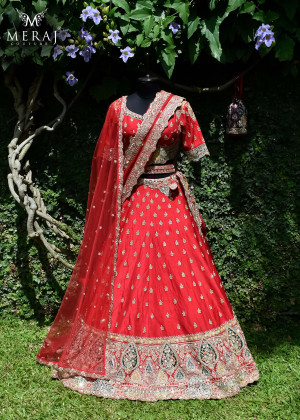vibrant red ghagra choli ensembled from pure raw silk