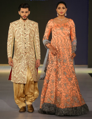 Scintillating Fur Gown & Sherwani Couple