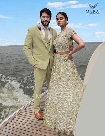 Delicately Embellished : Scintillating Green Crop top with Lehenga with Stunning Sorrento Green suit with Printed Lapel